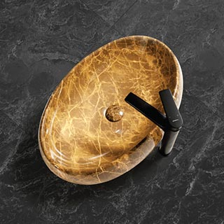 Golden colored Art basin & Black colored faucet  photography